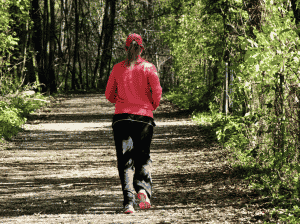 Tips to make social distancing more exciting (and healthy) 3 Woman running in the forest