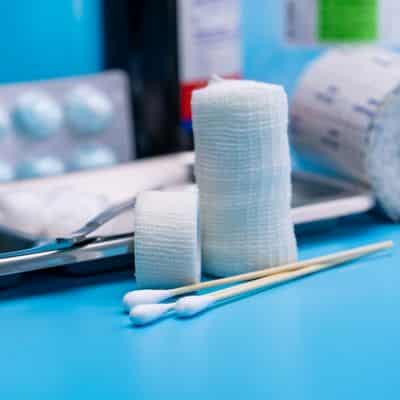 wound care supplies on a blue table