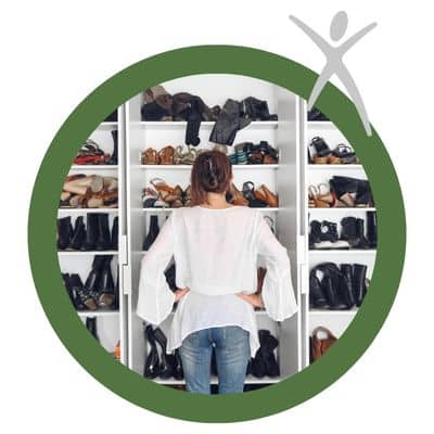 Choosing the right shoes for your health 4 Woman looking at a closet of shoes