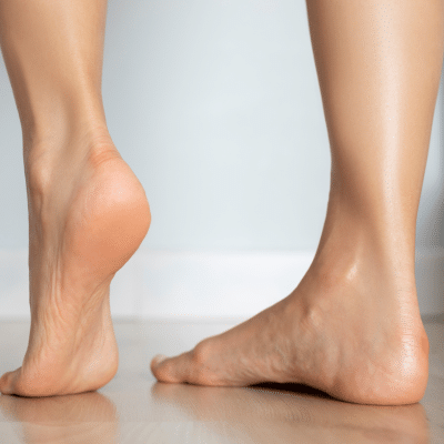 Photo of bottom portion of legs and feet
