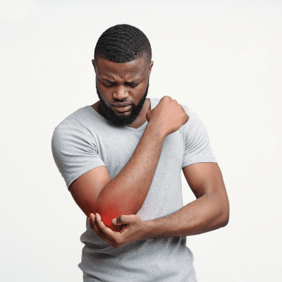 What is arthroscopy and why are patients choosing it? 2 Man experiencing elbow pain, representing what is arthroscopy?